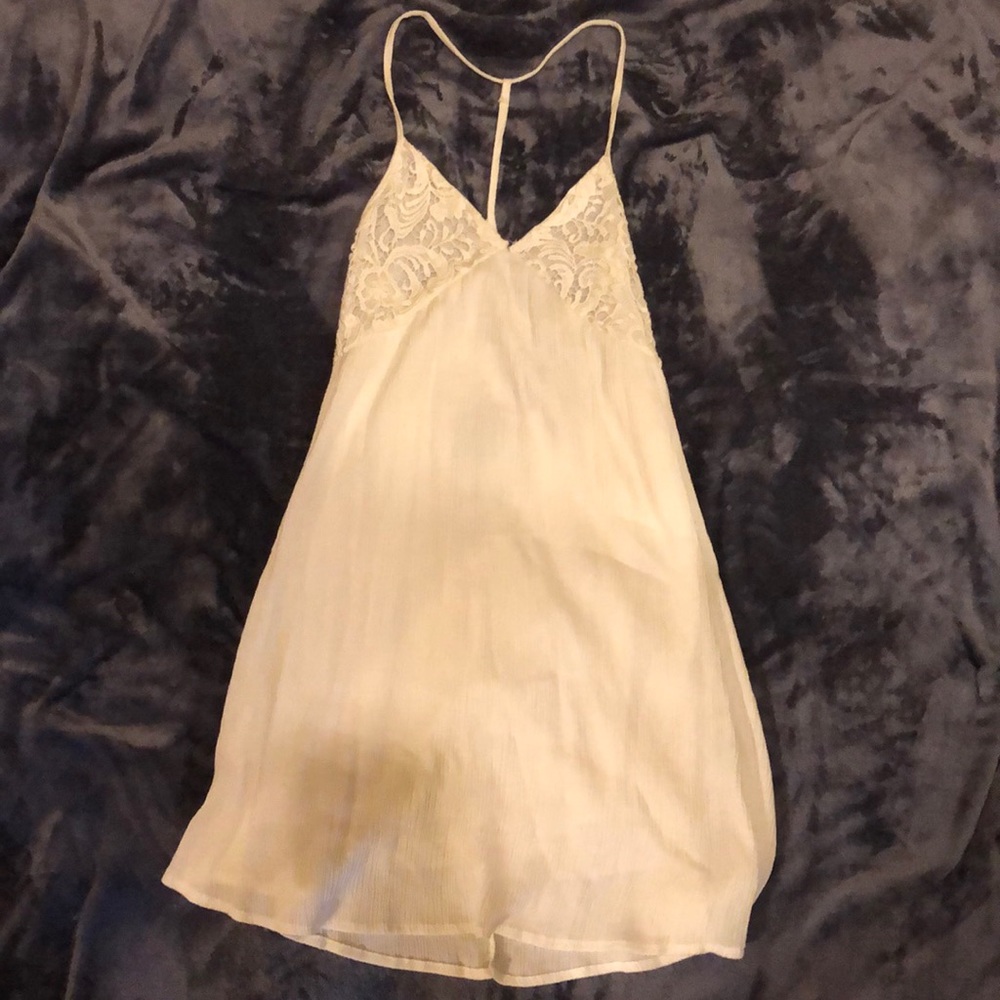 White dress with open lace back